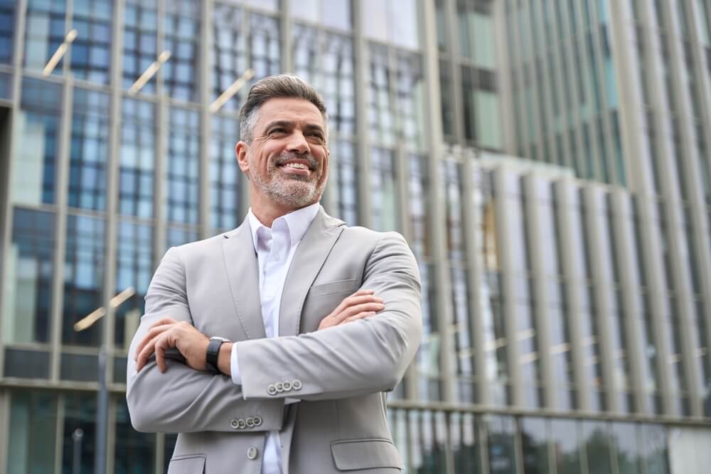 CEO in front of his company which started as a startup