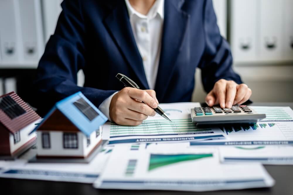 Insurance agent with a calculator