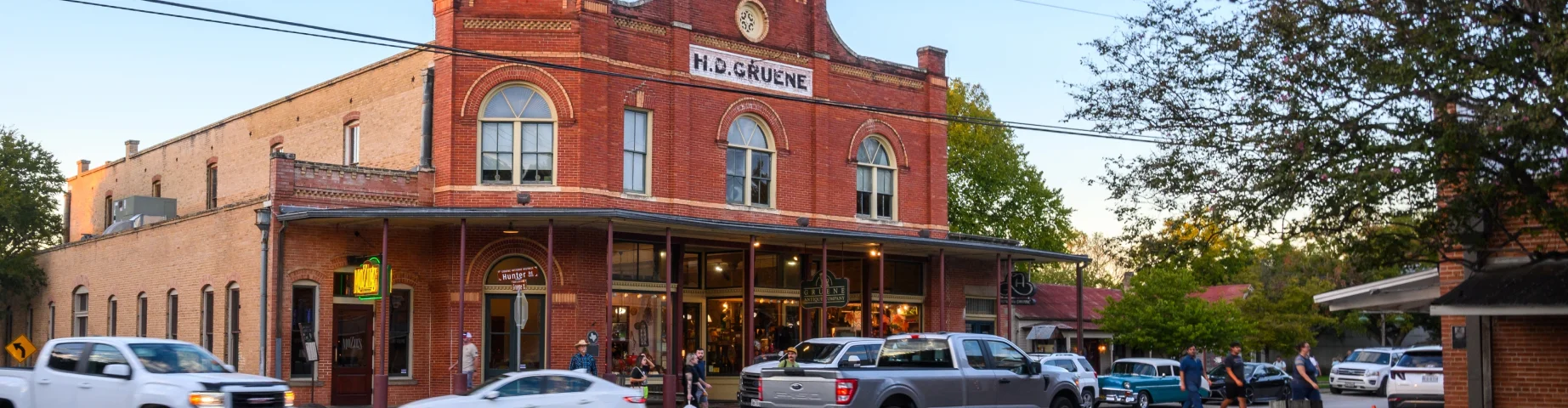 Gruene, Texas, USA - October 9, 2023: Main street with old brick building in historic town of Gruene in Texas. USA – Home insurance in Texas